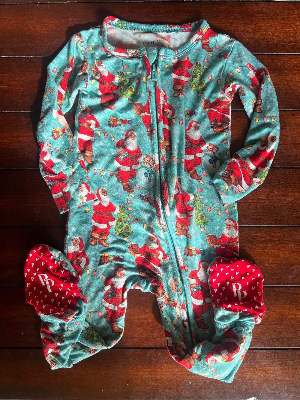 Posh Peanut Teal & Red Santa Print Footed Sleeper